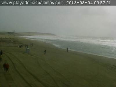 Blick auf den Strand von Maspalomas am Vormittag - es sieht aus, wie mitten in der Nacht.